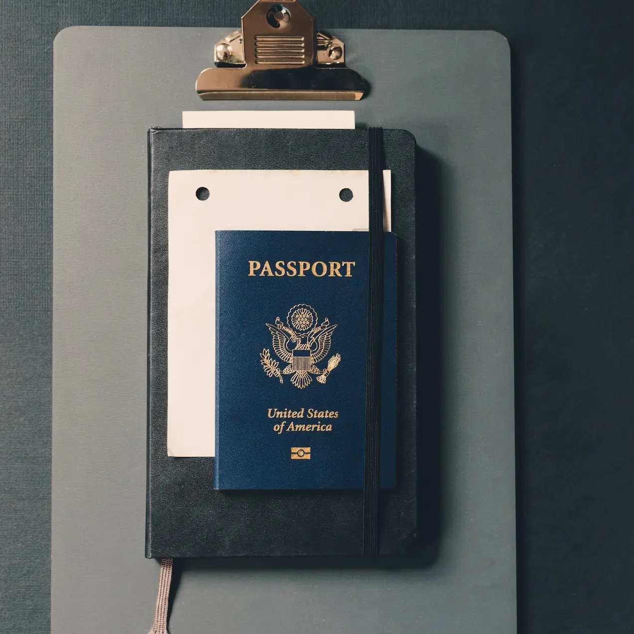 passport on clipboard